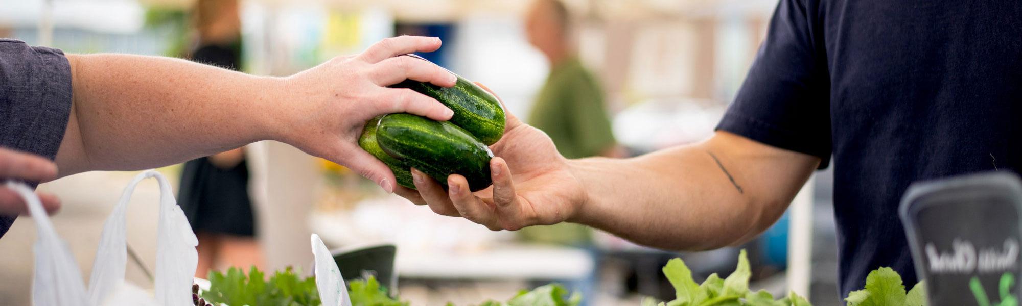 purchasing produce at the farm market